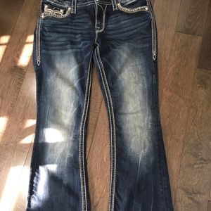 Woman’s Rock Revival Jeans mid-rise.Size 29.